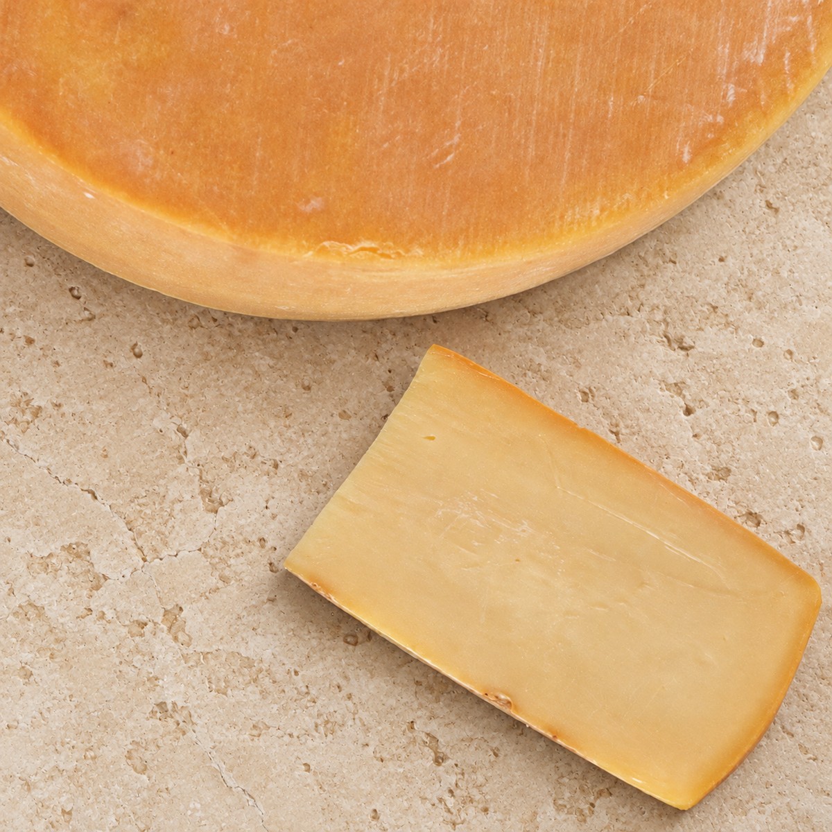 Peça e cunha do queijo Raclette Serra das Antas